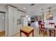 Open concept kitchen and living space with a cozy fireplace at 8388 Brad Oaks Cir, Las Vegas, NV 89123