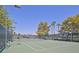 Community tennis court view with mature shade trees and updated lighting at 8388 Brad Oaks Cir, Las Vegas, NV 89123