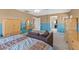 Spacious bedroom featuring a chaise lounge and bright decor at 8723 Melissa Meadows St, Las Vegas, NV 89131