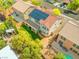 Beautiful two-story home featuring a well-manicured lawn, covered porch, and solar panels on the roof at 8723 Melissa Meadows St, Las Vegas, NV 89131