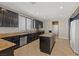 Spacious kitchen features a center island, stainless steel appliances, and granite countertops at 8723 Melissa Meadows St, Las Vegas, NV 89131