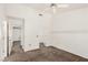 Bright bedroom with neutral carpet, ceiling fan, and multiple entryways at 8921 Signal Terrace Dr, Las Vegas, NV 89134