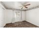 Cozy bedroom features a ceiling fan, neutral paint, and plush brown carpeting at 8921 Signal Terrace Dr, Las Vegas, NV 89134