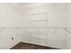 Walk-in closet with carpet and wire shelving at 8921 Signal Terrace Dr, Las Vegas, NV 89134