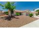 Charming single-story home featuring a desert landscape and a two-car garage at 8921 Signal Terrace Dr, Las Vegas, NV 89134