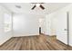 Bedroom with a ceiling fan and wood floor at 9050 W Tropicana Ave # 1075, Las Vegas, NV 89147