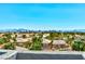 An elevated view captures the city skyline, showcasing the neighborhood's proximity to urban amenities at 9050 W Tropicana Ave # 1075, Las Vegas, NV 89147