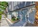 The exterior presents a modern facade with a private entrance, showcasing the unit's curb appeal at 9050 W Tropicana Ave # 1075, Las Vegas, NV 89147