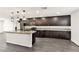 This kitchen boasts modern appliances, granite countertops and an expansive island at 9050 W Tropicana Ave # 1075, Las Vegas, NV 89147