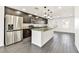 Modern kitchen with stainless appliances, granite counters, and ample storage space at 9050 W Tropicana Ave # 1075, Las Vegas, NV 89147
