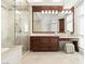 Modern bathroom with a glass shower, large vanity, and stunning tile work, providing a spa-like retreat at 9101 Alta Dr # 1604, Las Vegas, NV 89145