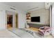 Comfortable bedroom featuring padded headboard, city views, and elegant furnishings at 9101 Alta Dr # 1604, Las Vegas, NV 89145