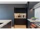 Well-appointed kitchen with custom cabinets, marble counters and backsplash, and luxury appliances at 9101 Alta Dr # 1604, Las Vegas, NV 89145