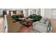 Spacious living room featuring plush seating, a stylish area rug, and an open floor plan to the kitchen at 9101 Alta Dr # 1604, Las Vegas, NV 89145