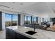 Open-concept living space with granite countertops, scenic views, and contemporary design at 9101 Alta Dr # 1604, Las Vegas, NV 89145