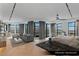 Serene main bedroom with floor-to-ceiling windows, city views, and stylish furnishings at 9101 Alta Dr # 1604, Las Vegas, NV 89145