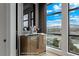 Modern mini refrigerator with a view of the outside from the window at 9101 Alta Dr # 1604, Las Vegas, NV 89145