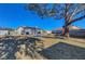 Backyard features a pool and playground for outdoor fun and recreation at 9398 Sailing Water Ave, Las Vegas, NV 89147