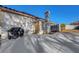 House exterior showcasing a backyard with paved space, access gate, and potential for landscaping at 9398 Sailing Water Ave, Las Vegas, NV 89147