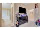 Bedroom with a dresser, ensuite bathroom, and two closets, offering ample storage and privacy at 9398 Sailing Water Ave, Las Vegas, NV 89147