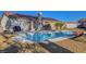 Backyard features a sparkling pool and patio, great for outdoor enjoyment at 9398 Sailing Water Ave, Las Vegas, NV 89147