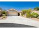 Charming single-story home with a two-car garage and xeriscaped front yard at 9525 Salem Hills Ct, Las Vegas, NV 89134