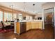 Bright kitchen with light wood cabinets, stainless steel appliances, and an adjacent dining area at 9525 Salem Hills Ct, Las Vegas, NV 89134