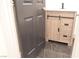 Stylish bathroom showcasing vanity with drawers and black marble floors enhancing modern appeal at 9604 Flying Eagle Ln, Las Vegas, NV 89123