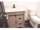 Bathroom featuring a modern vanity with a sleek black faucet and stylish fixtures at 9604 Flying Eagle Ln, Las Vegas, NV 89123