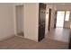 A simple bedroom showcasing a closet with sliding doors and gray carpet at 9604 Flying Eagle Ln, Las Vegas, NV 89123