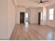 Bright living room featuring wood floors, neutral walls and modern finishes at 9604 Flying Eagle Ln, Las Vegas, NV 89123