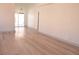 Spacious living room with wood floors and plenty of natural light at 9604 Flying Eagle Ln, Las Vegas, NV 89123
