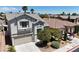 Charming two-story home featuring well-maintained landscaping at 9748 Derbyhill Cir, Las Vegas, NV 89117