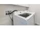 Bright laundry room featuring a Samsung washer and dryer set for modern convenience at 9748 Derbyhill Cir, Las Vegas, NV 89117