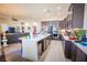 Spacious open-concept kitchen with modern appliances, lots of storage, and a large island at 10391 Avebury Manor Ln, Las Vegas, NV 89135