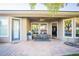 Covered patio featuring outdoor seating, a ceiling fan, BBQ and views of the landscaped backyard at 10391 Avebury Manor Ln, Las Vegas, NV 89135