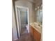 Well-lit bathroom with modern fixtures and a shower-tub combination at 10548 Ettenmoor Ave, Las Vegas, NV 89135