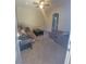 Inviting living room with plush sectional sofa and ceiling fan for relaxing ambiance at 10548 Ettenmoor Ave, Las Vegas, NV 89135
