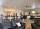 Open concept living space connecting the kitchen, dining, and living areas at 10548 Ettenmoor Ave, Las Vegas, NV 89135