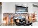 Close up on kitchen featuring granite countertops, modern appliances and decorative copper accents at 1125 Meadow Sparrow Pl, Henderson, NV 89011