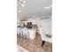 Bright kitchen with modern appliances, quartz countertop, and decorative accents at 1125 Meadow Sparrow Pl, Henderson, NV 89011