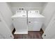 A laundry room with a white washing machine and dryer at 1125 Meadow Sparrow Pl, Henderson, NV 89011