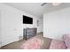 Cozy main bedroom with carpet, a dresser and a pink rug at 1125 Meadow Sparrow Pl, Henderson, NV 89011