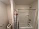 Bathroom with shower and tub and toilet at 1145 Belton Lake Ave, North Las Vegas, NV 89086