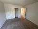 Bedroom with closet and doorways, offering a versatile space for rest and storage at 1145 Belton Lake Ave, North Las Vegas, NV 89086