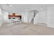 Open-concept living area showcases stairs, dining space, and access to the kitchen at 1145 Belton Lake Ave, North Las Vegas, NV 89086