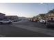 Street view showing multiple parked cars and mountain view at 1145 Belton Lake Ave, North Las Vegas, NV 89086