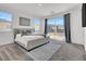 Spacious bedroom with balcony access offers a seamless indoor-outdoor living experience at 1297 Ventura Cliffs Ave, Henderson, NV 89012