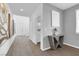 Hallway with stylish wood flooring and attractive wall decor leading to other rooms at 1297 Ventura Cliffs Ave, Henderson, NV 89012