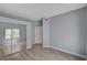 Bedroom featuring sliding closet doors, a window, and light wood flooring at 1501 Oscar Ct # 101, Las Vegas, NV 89146